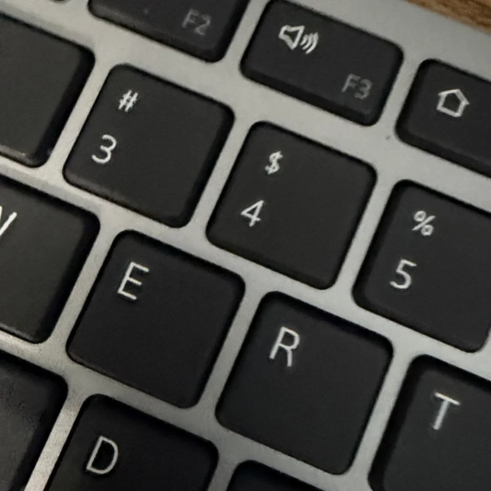 Sleek Black and Silver Laptop Keyboard